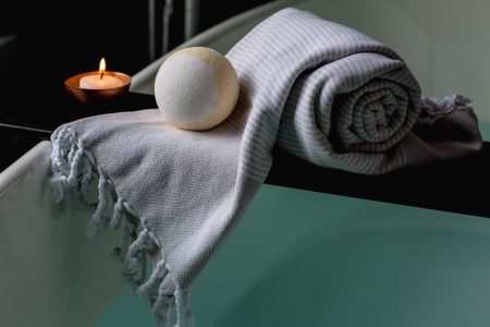 white-and-brown-bath-ball-on-grey-scarf-374032